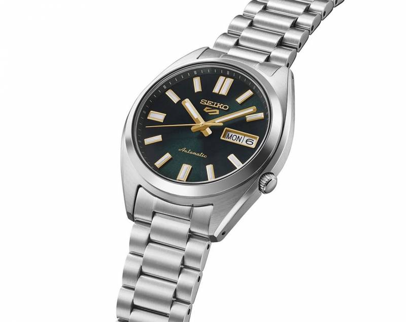Seiko_o 5 Sports SNXS Automatic silver green and yellow niddle